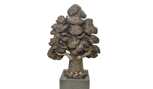 Mosiężna statuetka w kształcie drzewa – dęby, która jest wręczana osobom otrzymującym tytuł Wolontariusza Roku