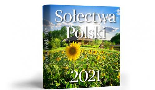 Książka - album. Na jego okładce jest zdjęcie pola słoneczników. Nad nimi niebieskie niebo. Na nim znajduje się biały napis Sołectwa Polski 2021. 
