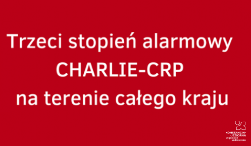 Baner Rządowego Centrum Bezpieczeństwa o wprowadzeniu opisywanego w artykule stopnia. 	Na czerwonym tle logotyp RCB oraz tekst: Trzeci stopień alarmowy CHARLIE-CRP na terenie całego kraju.