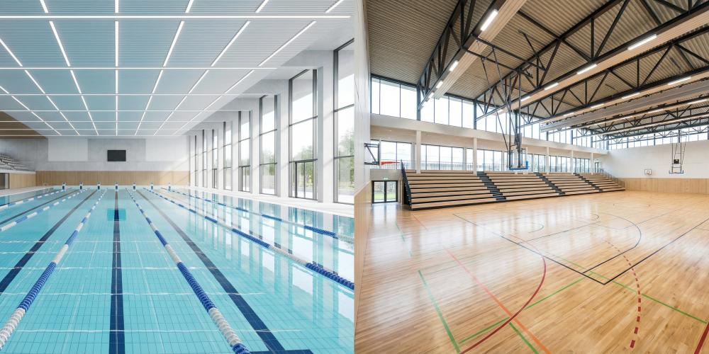 Wizualizacja przedstawiająca nowoczesny basen sportowy z torami pływackimi oraz wielofunkcyjną halę sportową z trybunami i boiskami do gier zespołowych.