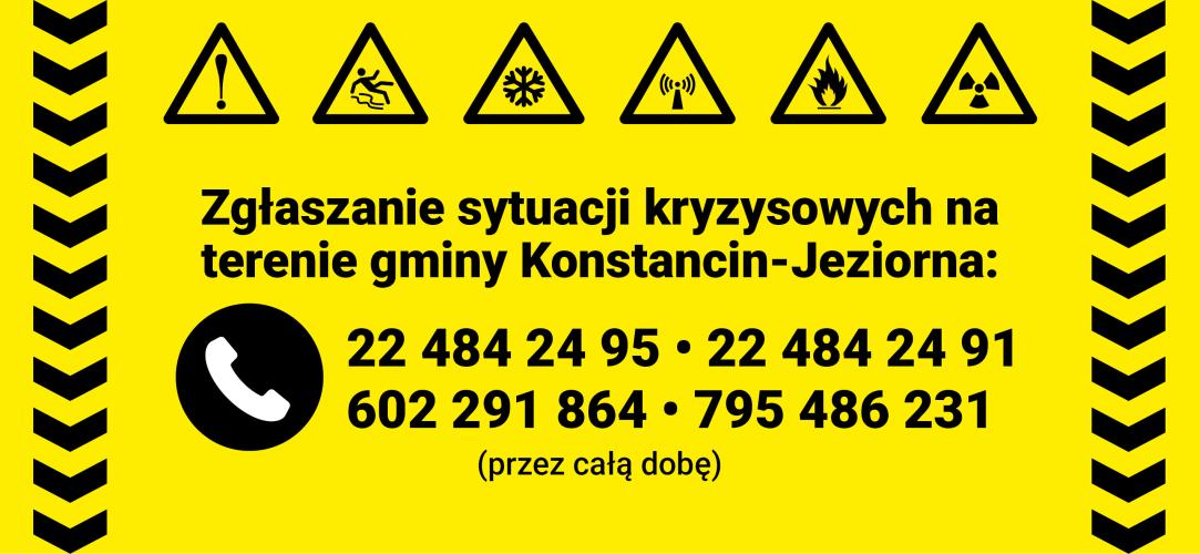 Żółta plansza informacyjna z ikonami zagrożeń i numerami telefonów do całodobowego zgłaszania sytuacji kryzysowych na terenie gminy Konstancin-Jeziorna.