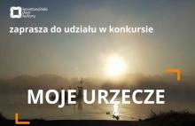 na pierwszym planie biały napis MOJE URZECZE, powyżej logo konstancińskiego domu kultury oraz napis zaprasza do udziału w konkursie. W tle zachód słońca nad rzeką.