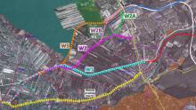 Mapa przedstawia różne warianty planowanych tras komunikacyjnych (W1, W2, W2A, W2B, W3) na tle istniejącej infrastruktury i terenu, z zaznaczonym obecnym przebiegiem drogi DW721.