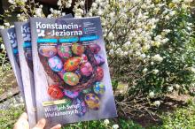 Biuletyn na tle kwitnącego drzewa