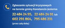 Pozioma grafika informacyjna na niebieskim tle z żółtym znakiem ostrzegawczym i numerami telefonów do całodobowego zgłaszania sytuacji kryzysowych na terenie gminy Konstancin-Jeziorna.