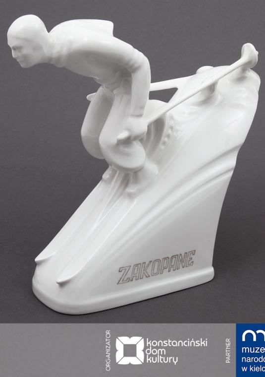 biała figurka narciarza na stoku w stylu art deco